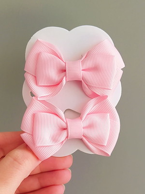 Par de laços para cabelo infantil rosa claro