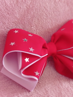 Laço vermelho com estrela