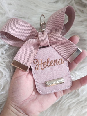 Chaveiro com laço bolsa maternidade todo rose