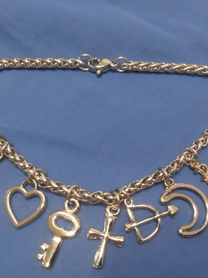Pulseira sete linhas mais tridentes mini.