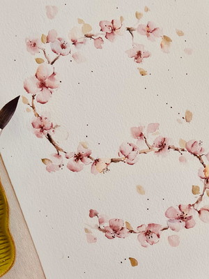 Aquarela floral com inicial do nome