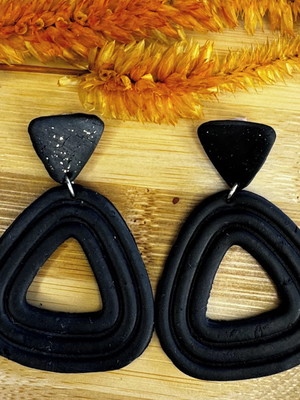 Brinco mônica preto