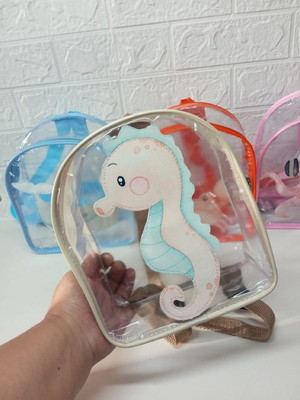 Mochilinha transparente com aplique