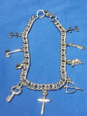 Pulseira de aço sete linhas com tridentes mini.