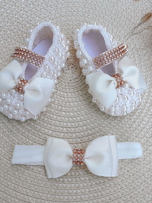 Sapato de pérola batizado