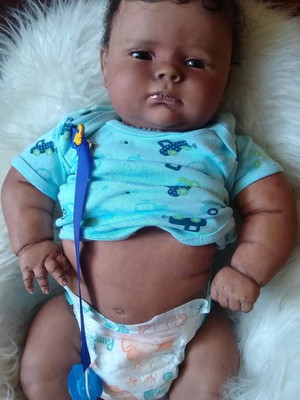 Bebê reborn joseph negro afro menino gordo