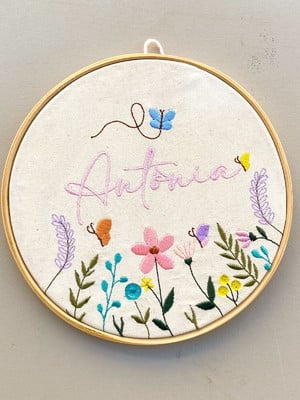 Porta maternidade menina