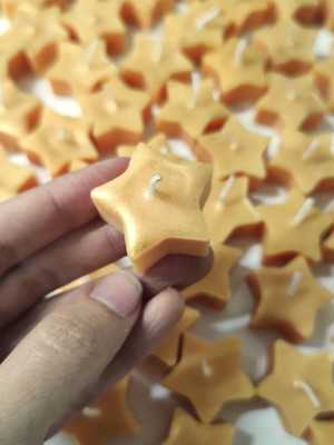 Vela flutuante estrelinha com aroma