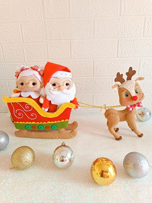 Papai noel e mamãe noel no trenó