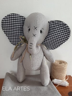 Elefante articulado de pelúcia