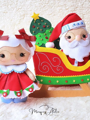 Papai noel e mamãe noel no trenó