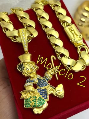 Corrente com pingente tio patinhas banhado a ouro 24k