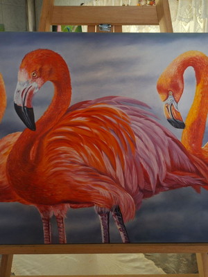 Pintura em tela de três flamingos