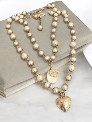 Mix de colares de pérolas boho chic e coração prata