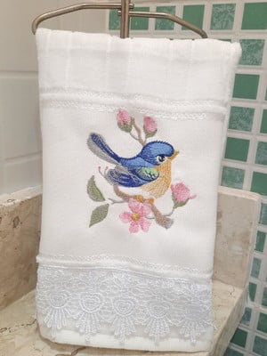 Toalha de lavabo bordada com gripir