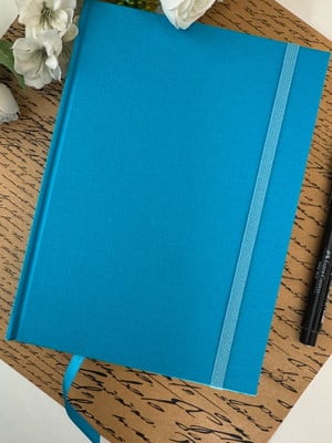 Caderno a5 (médio) quadriculado 150 folhas de 90g