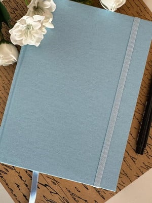 Caderno a5 (médio) quadriculado 150 folhas de 90g