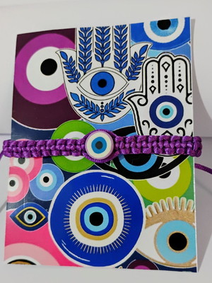 Pulseira de macramé com olho grego