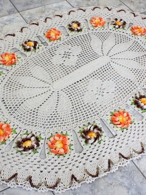 Tapete oval com flores manaca