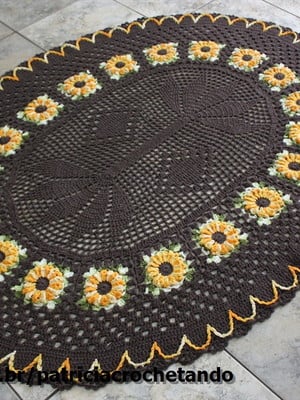 Tapete oval com flor girassol