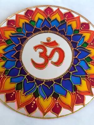 Mandala em espelho om 7 chamas 25cm