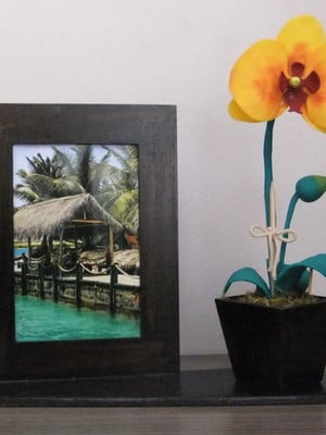 Porta retrato com orquídea