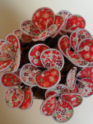 Vaso com flores em tecido