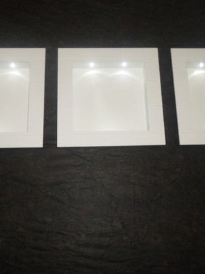 Tres nichos com led e moldura