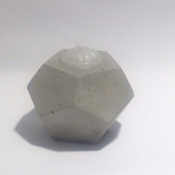Vela com base geométrica