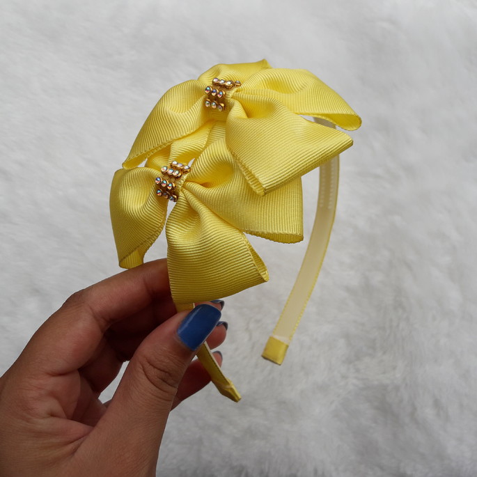 Imagem 1 - Tiara com laço amarelo com strass