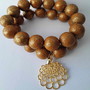 Imagem 1 - Dueto Pulseiras com Bolas Resina e Silicone Pingente Banhado