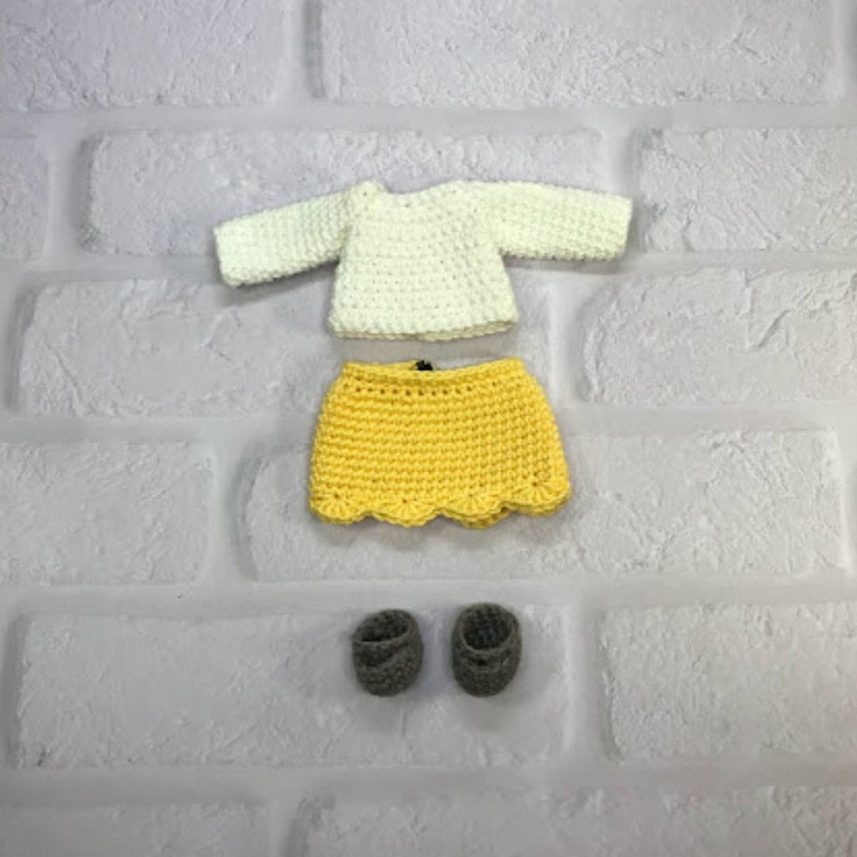 Boneca que troca de roupa em amigurumi